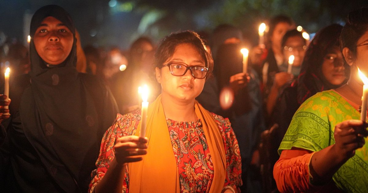 Candlelight vigil at night