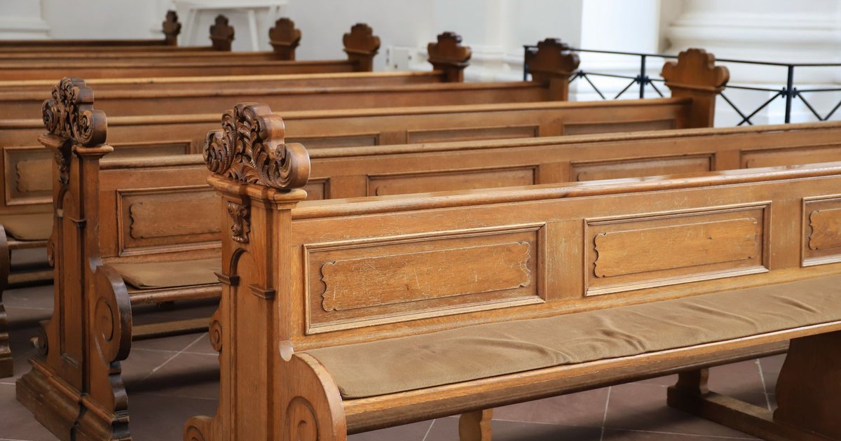 Empty courtroom interior with wooden benches